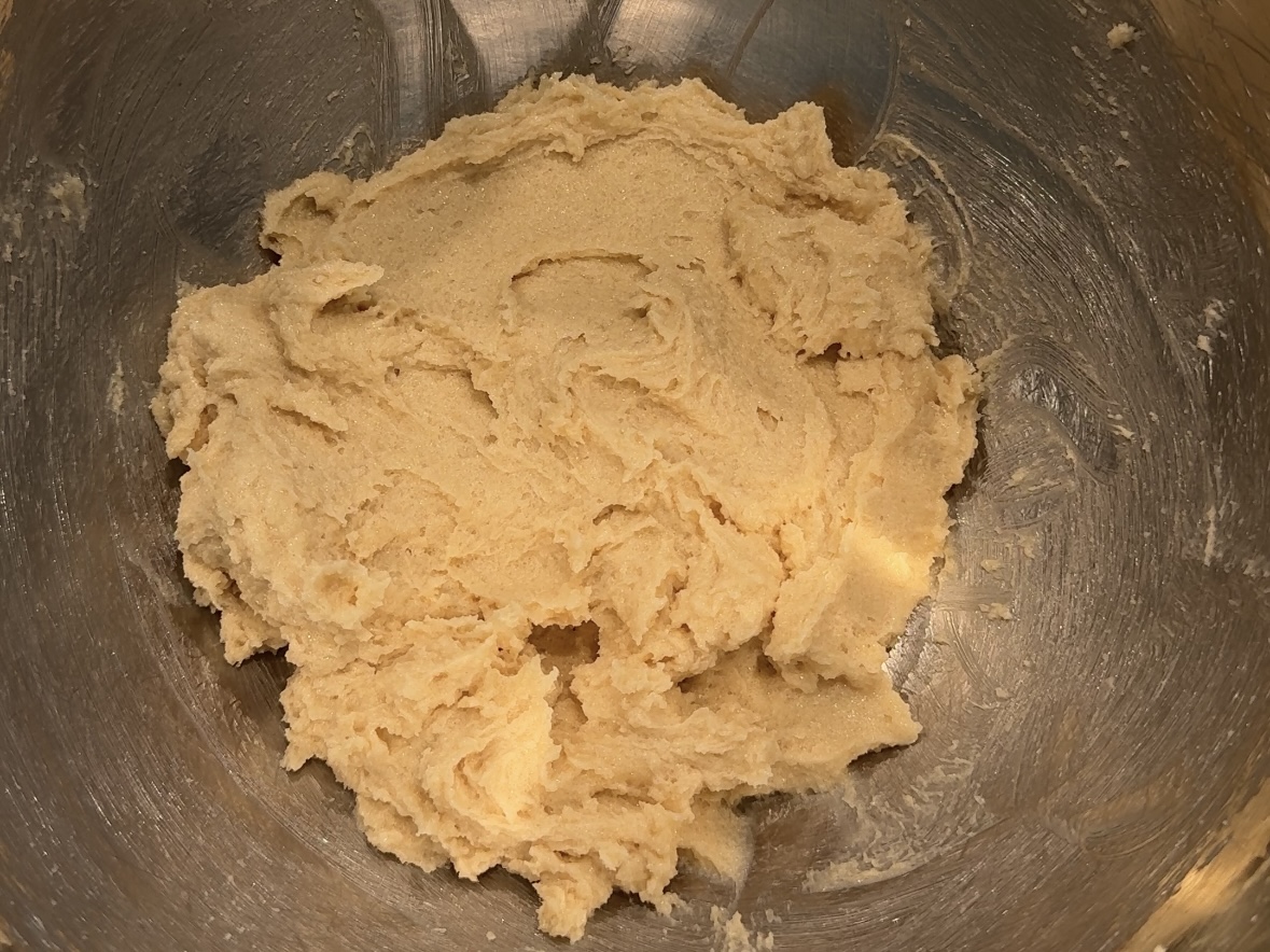 Butter and sugars mixed together in a bowl