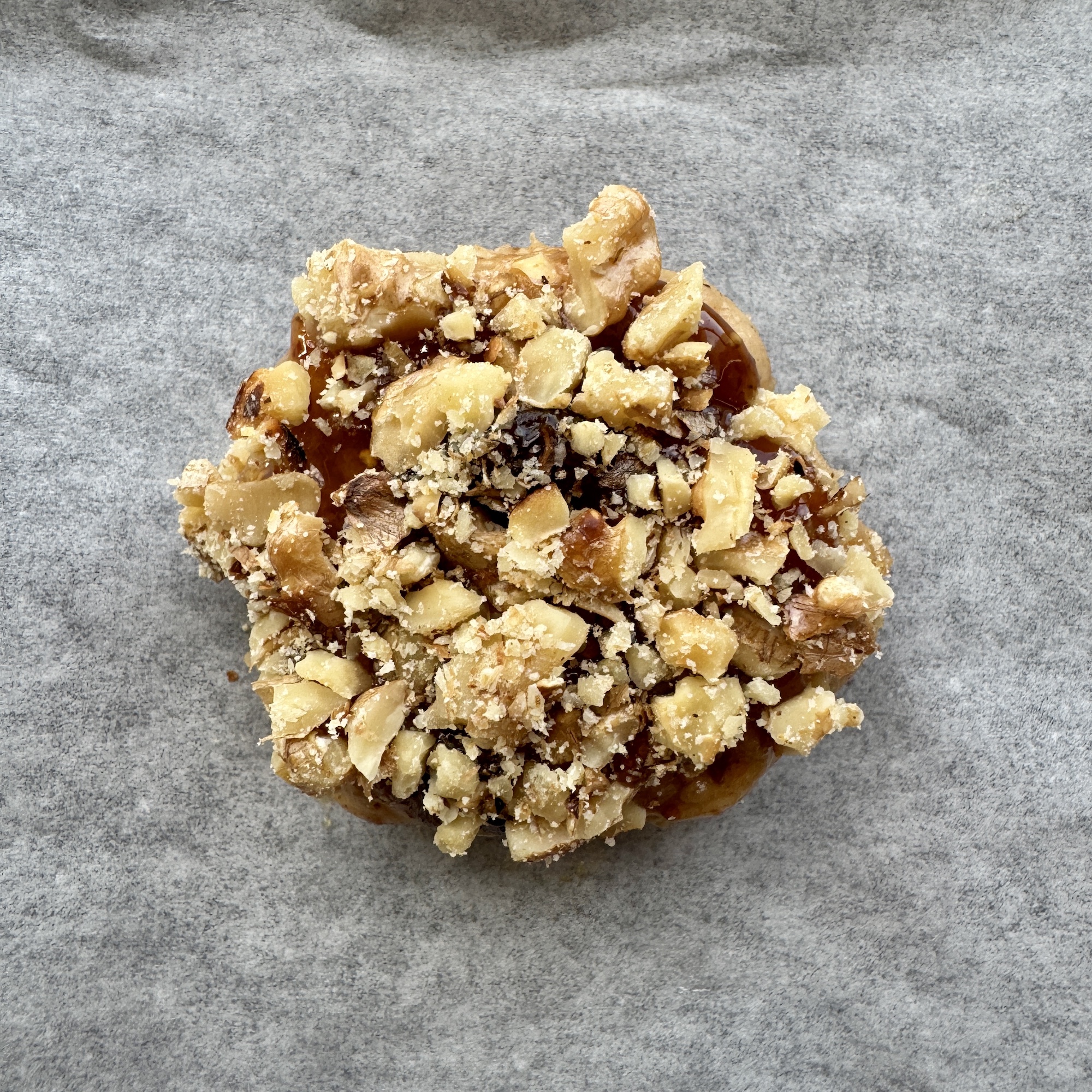 Cookie dough balls topped with fig jam and chopped walnuts