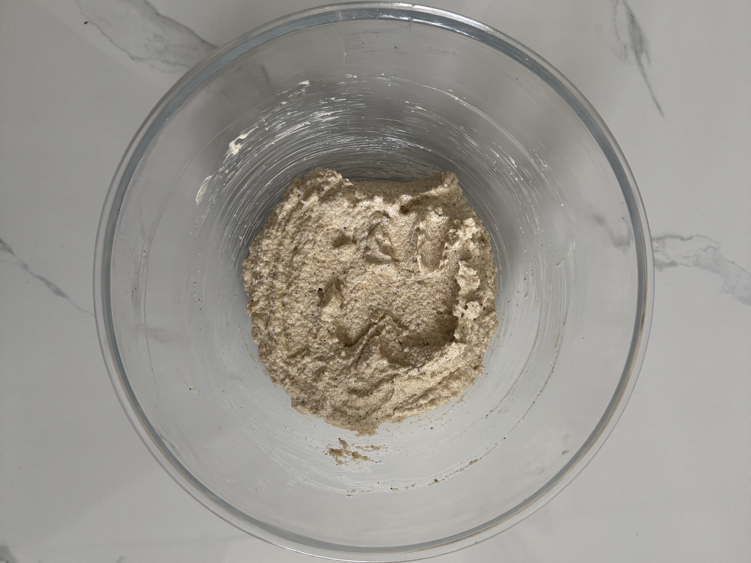 Wet ingredients mixed in glass bowl