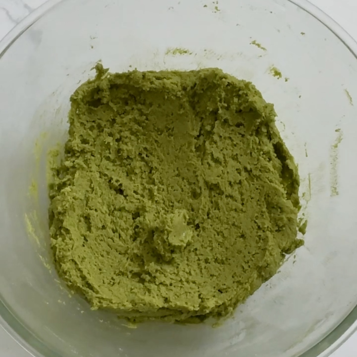 Dough ready in glass bowl