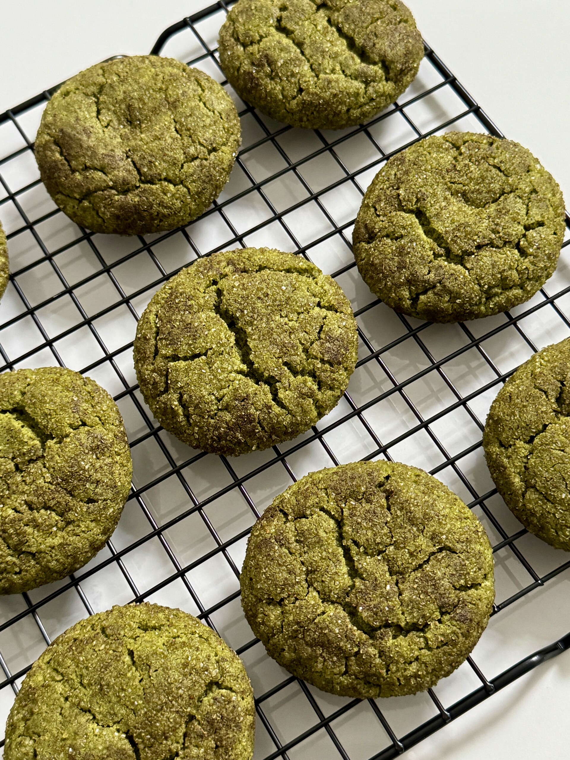 Matcha snickerdoodles on cooling rack