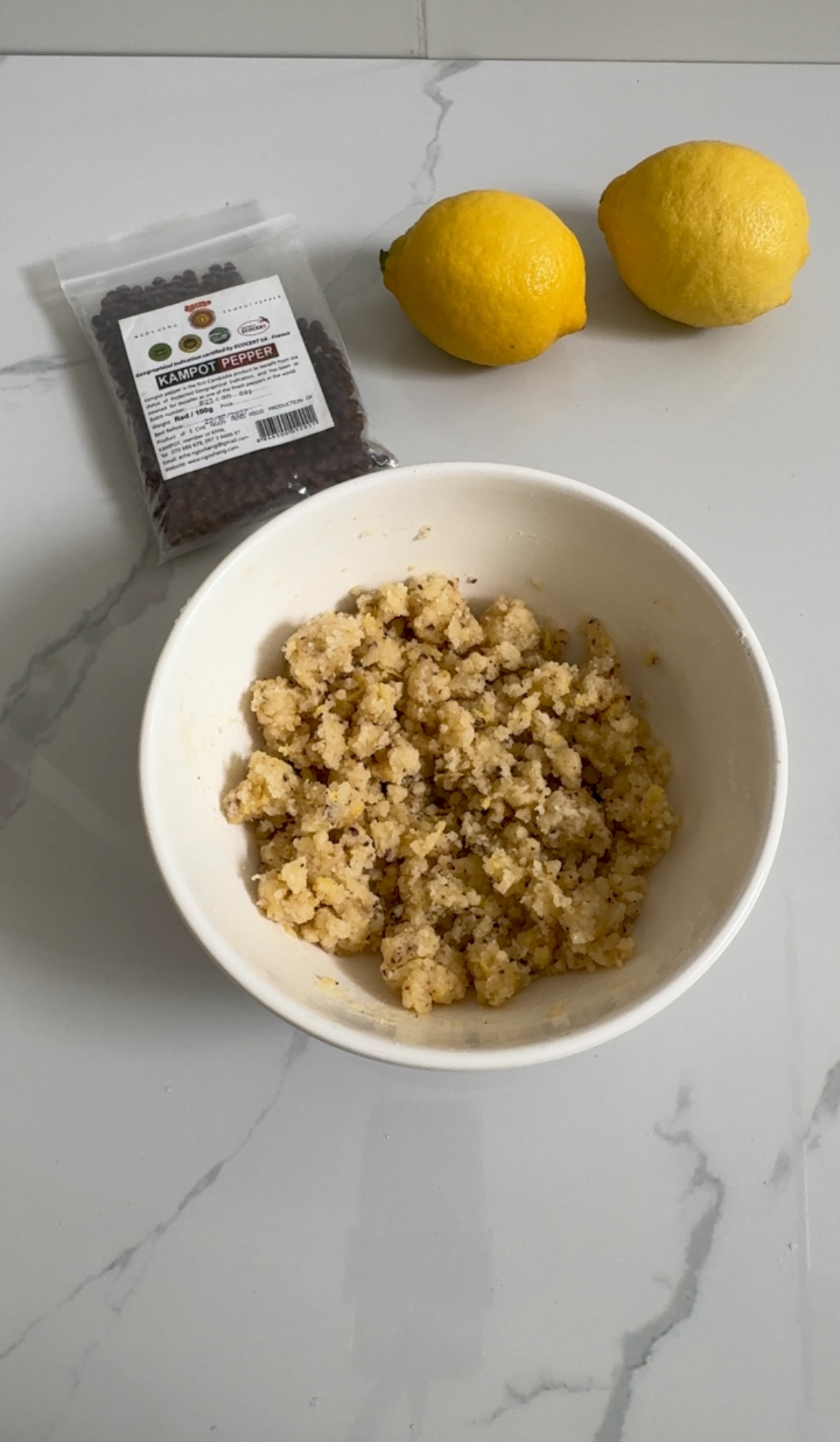 Lemon Kampot pepper streusel in a bowl
