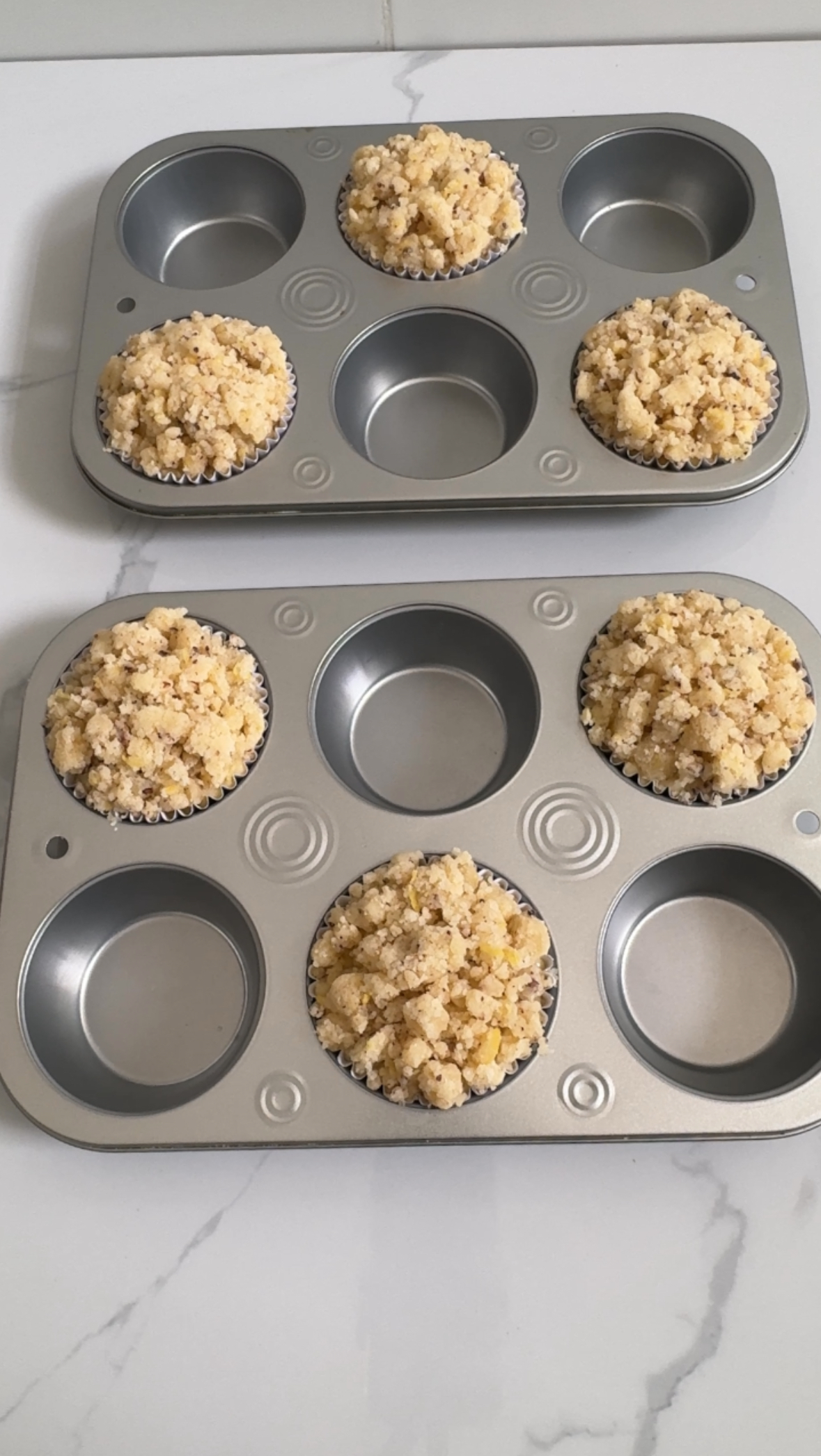 Streusel added on muffins